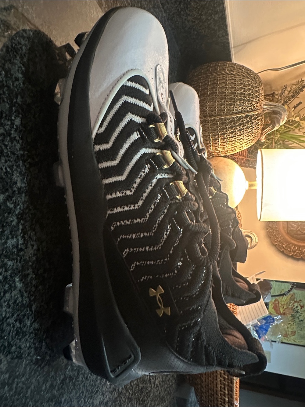 NWOT Under Armour Men’s Black and White Cleats with Gold Accents